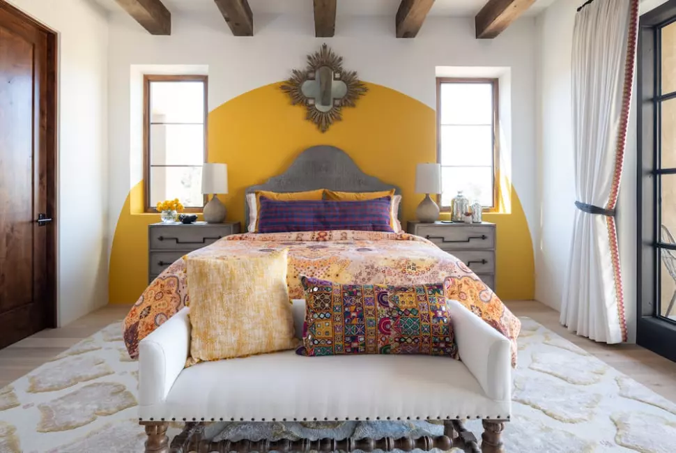 Southwestern inspired bathroom designed by Laura U with contemporary mirror