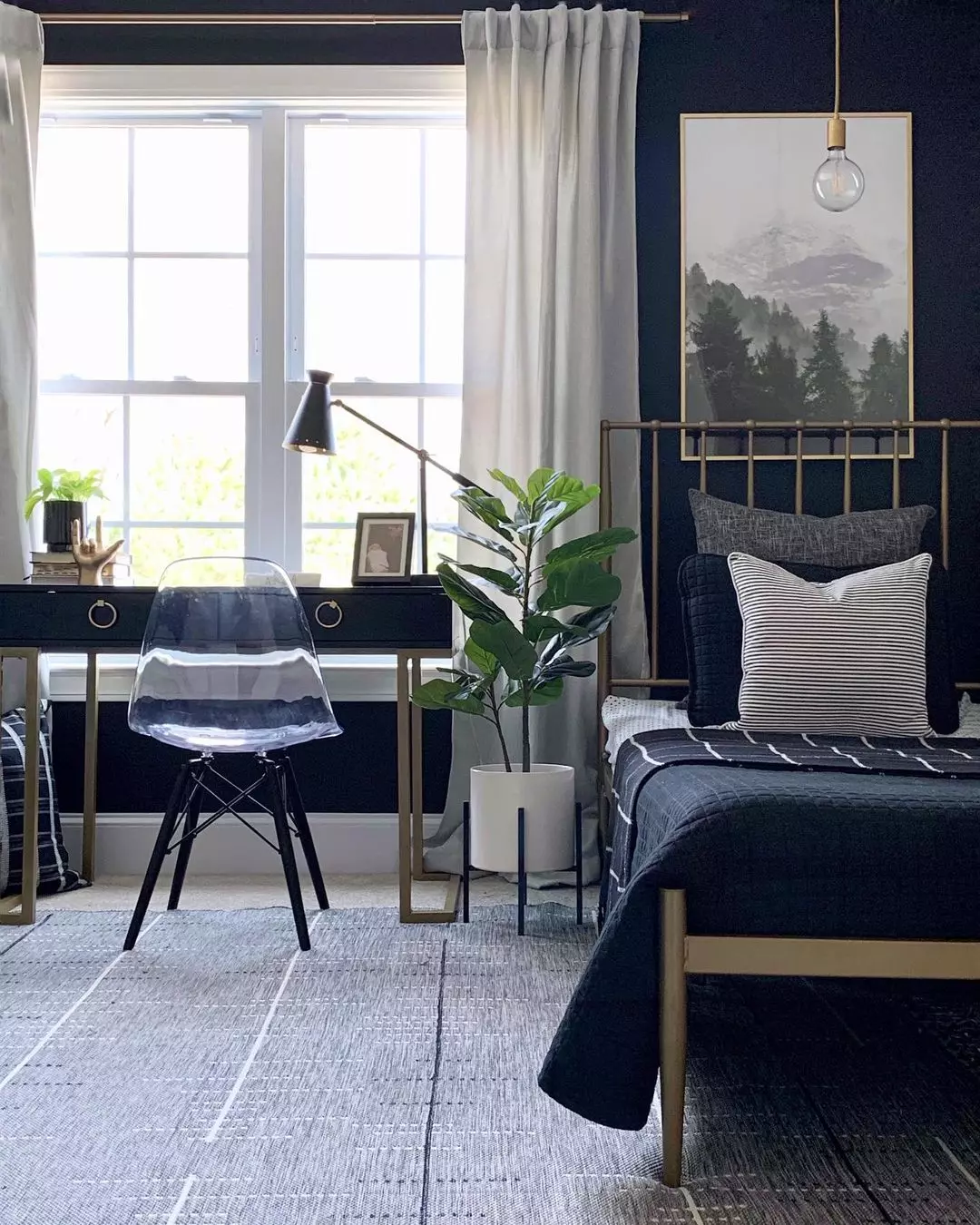 black and white bedroom with gold accents