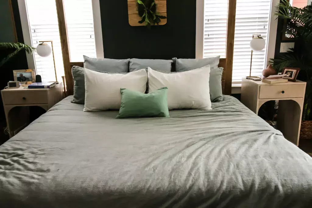 Layered Pillows on a King Bed