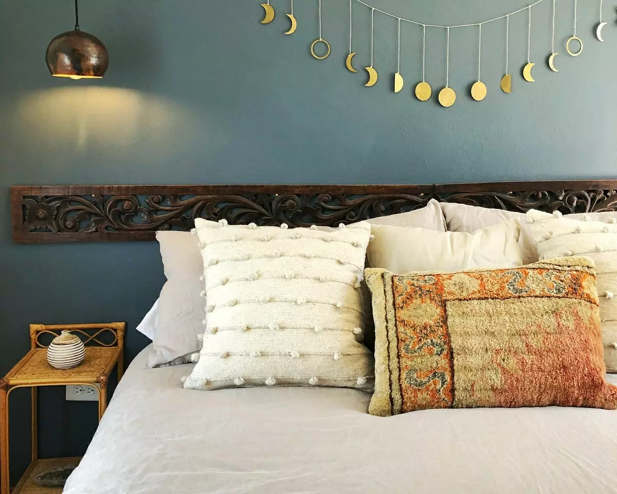 Mediterranean wall art and bedroom decor in a cozy interior