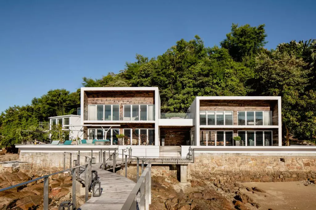 Twin houses make up OoaK Lamma, with an elevated herb garden connecting the structures