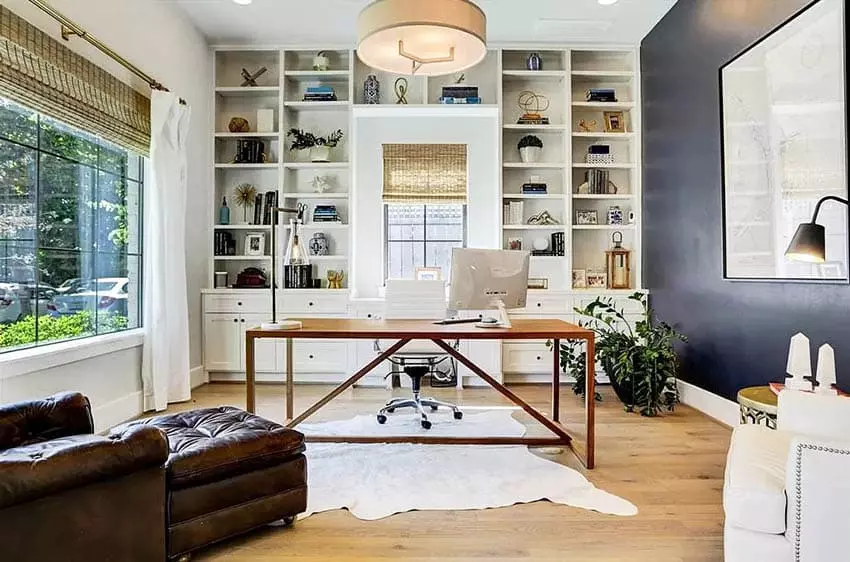 Office with desk and bookshelves with stand-alone desk