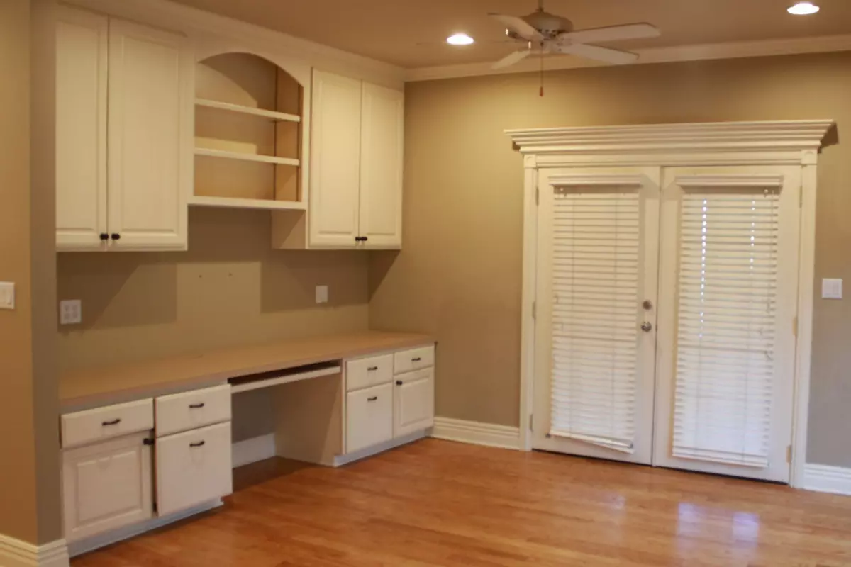 Before. Shelves with a built-in desk.