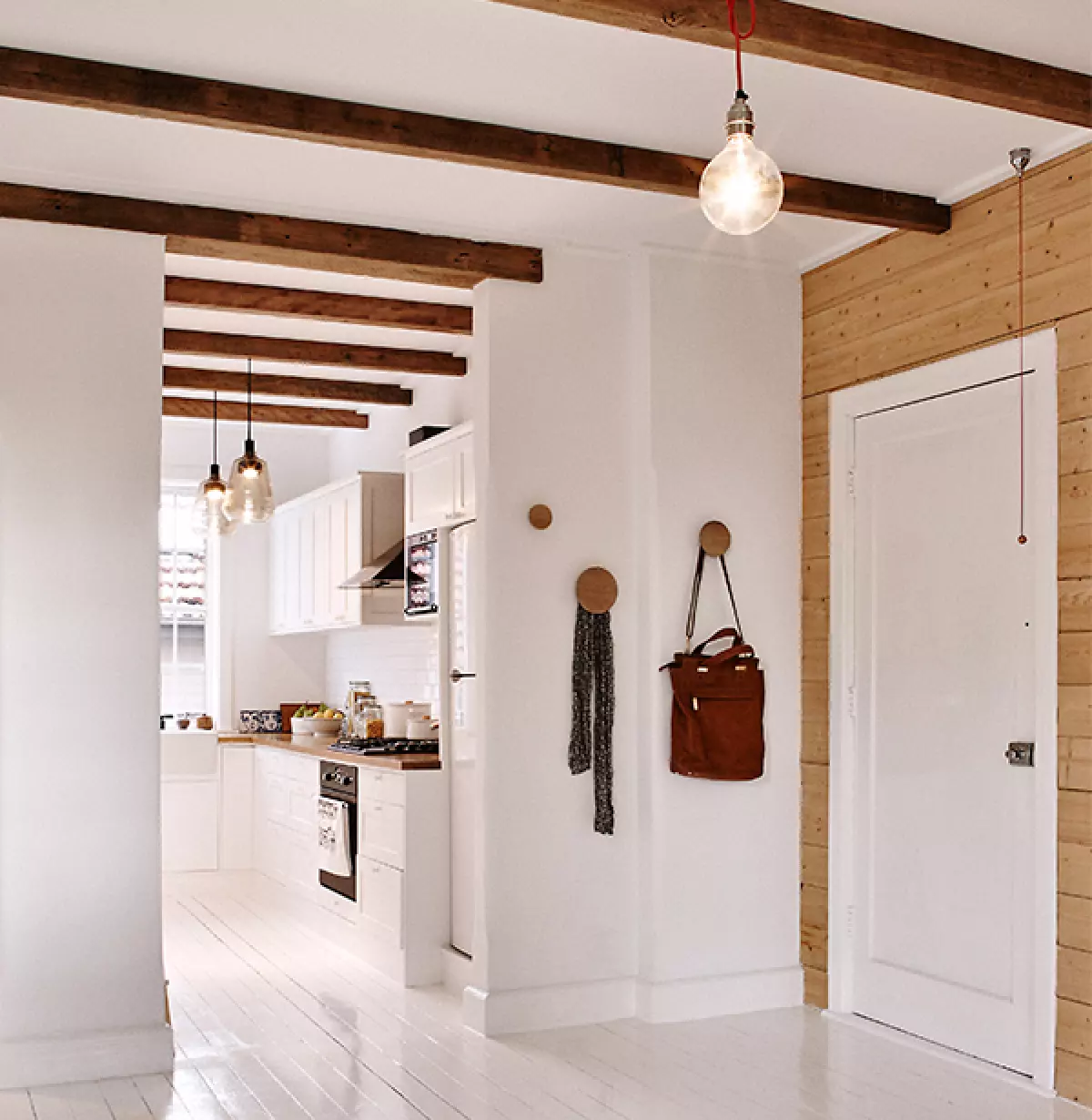 White painted modern kitchen with beams