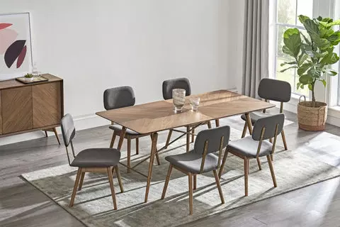 The Brighton Oval Dining Table with Austen Chairs sits 6 people comfortably.