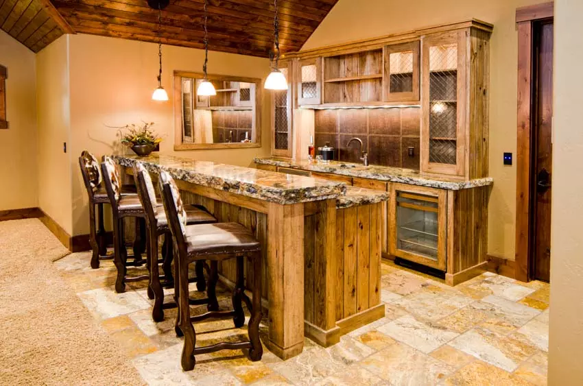 Home kitchen with wood countertops, and pine wood flooring