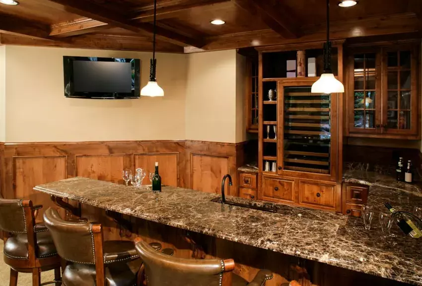 Laminate bar counter with leather seat stools and wood shelves