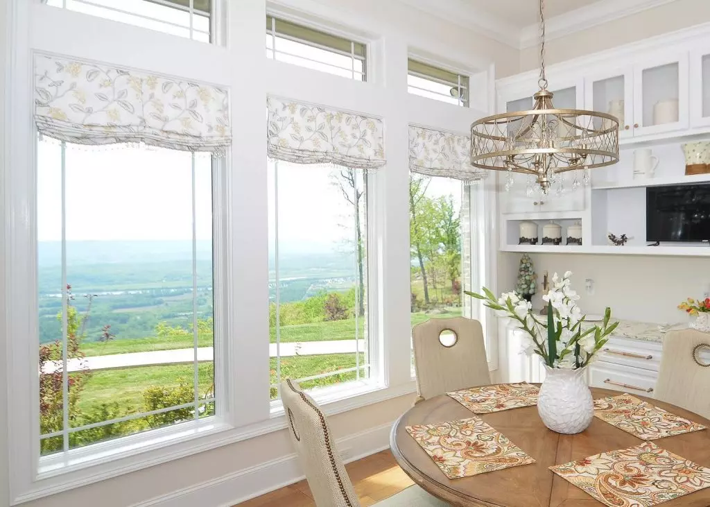 Kitchen with flat fold Roman shade on a window