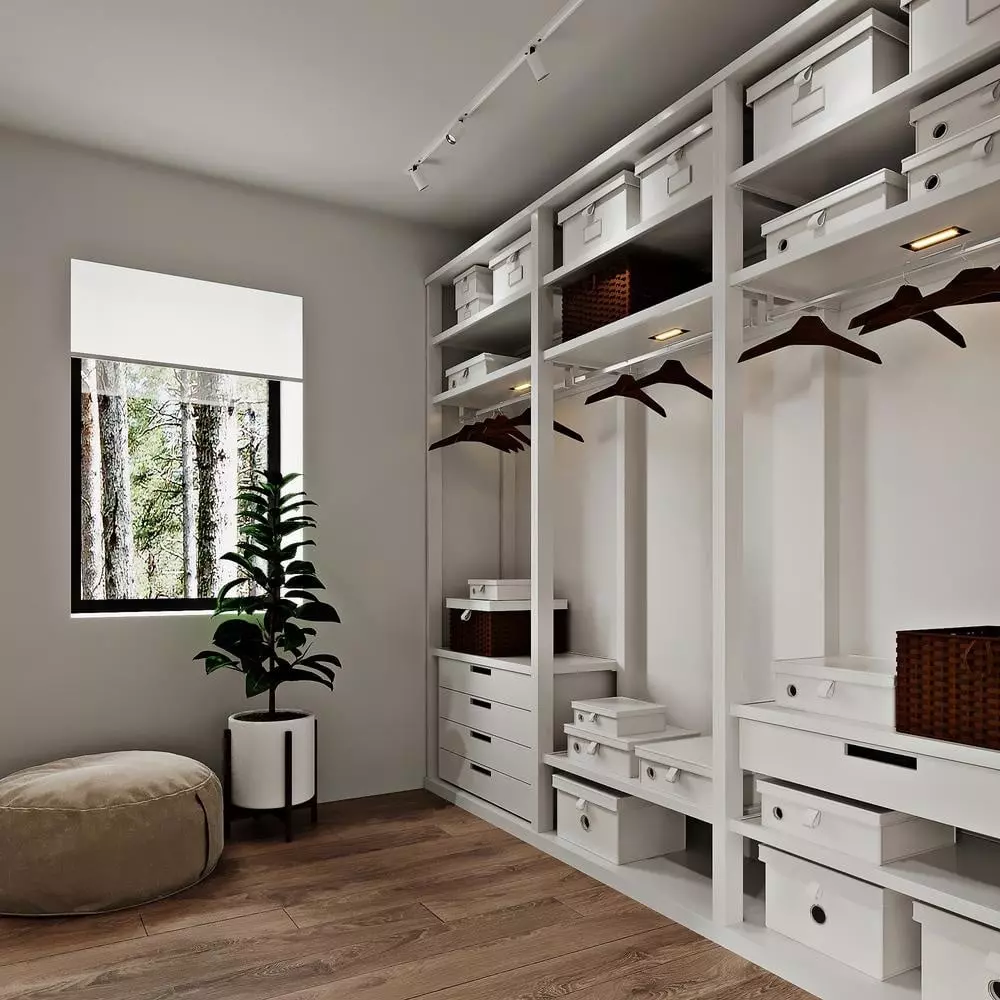 White stylish walk in closet with open sections