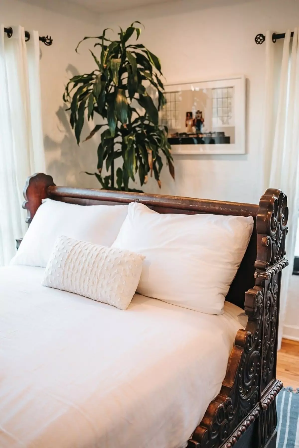 Antique Bedframe with White Bedding