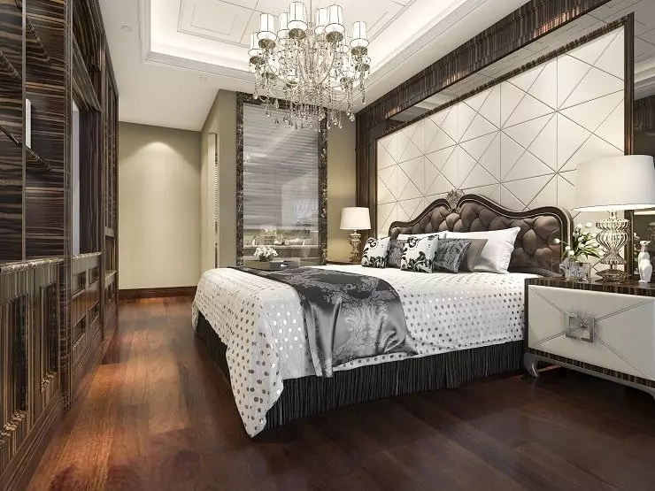 Bedroom with Light Wood Flooring and Dark Wood Furniture