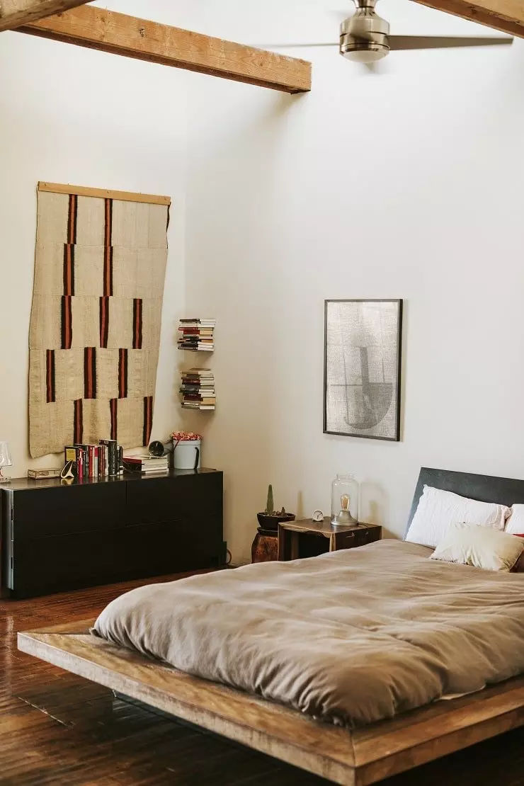 Bedroom with Exposed Wooden Architectural Beams