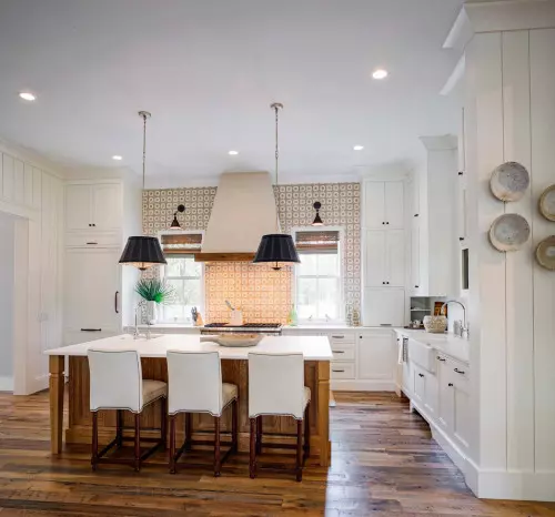 xposed beams, skylights, plastered range hood, and slab backsplash. Here you can see the lovely reclaimed wood floors. Walls and ceiling painted in Benjamin Moore "Wind"