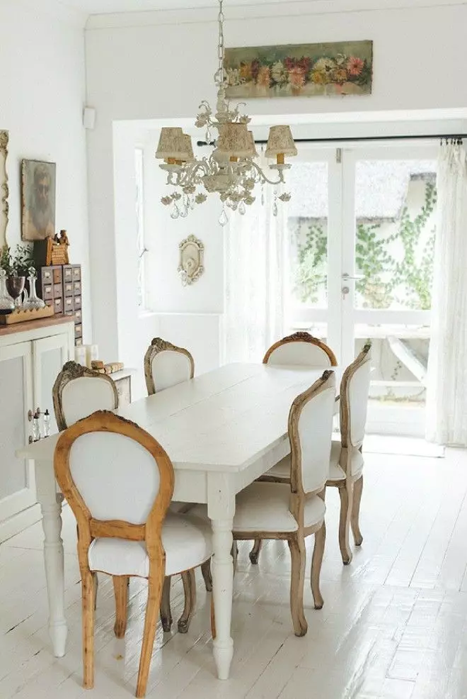 Wood Dining Table with Iron Legs in French Country Dining Room