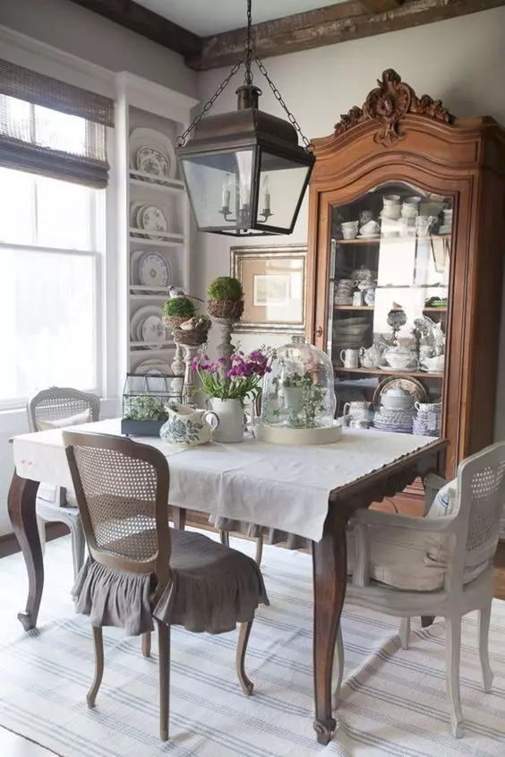 Two Crystal Chandeliers French Country Dining Room via @provencepoiriers