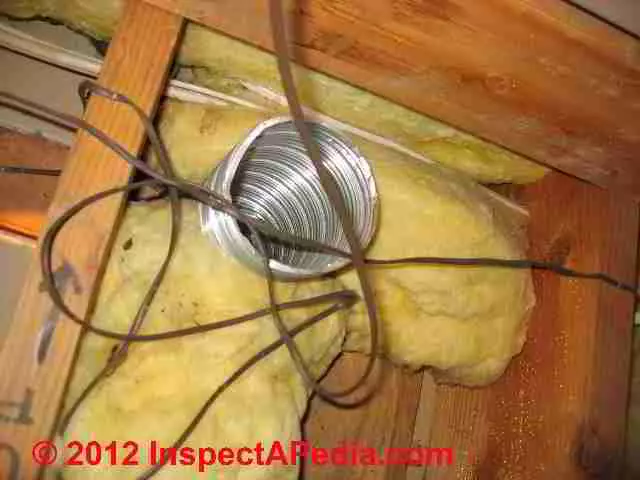 Bath vent spills into attic © D Friedman at InspectApedia.com