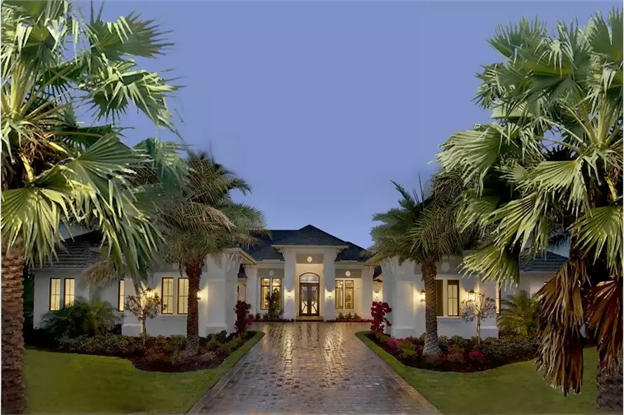 Spanish style home with chimneys that resemble California Mission bell towers