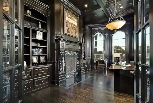 Ornate woodwork in the home office of a Spanish-Mediterranean style home