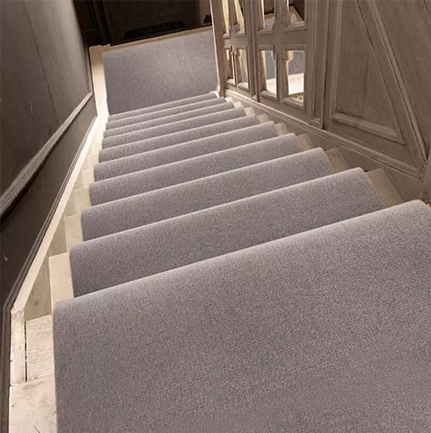 beautiful white wooden stairs with a tiled floor