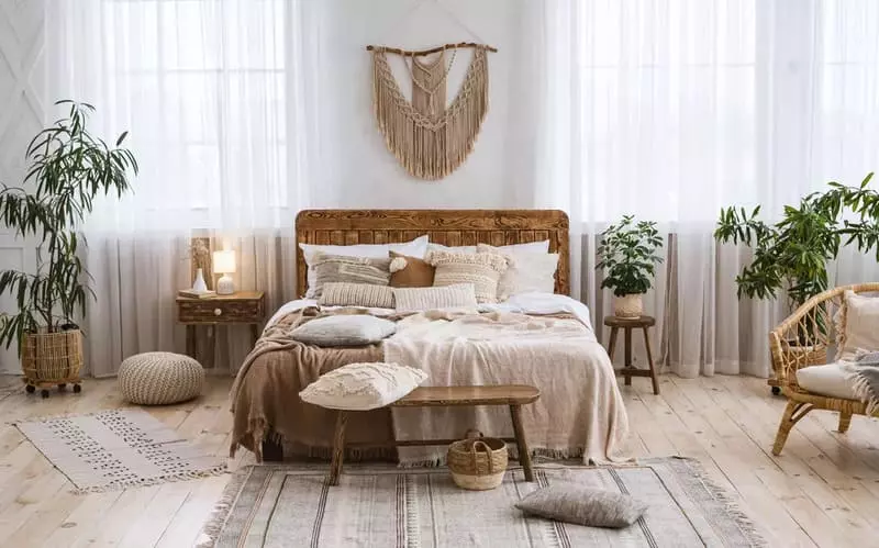 Boho style home decor bedroom with a bohemian-style bed and nightstand