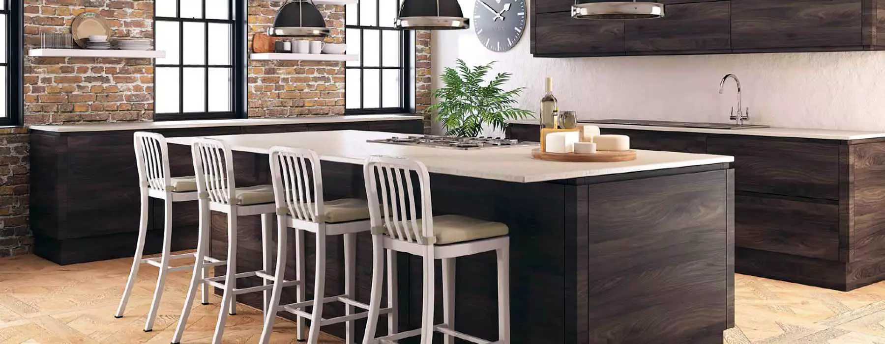 Red brick kitchen wall with dark wood flat-faced cabinets and cream-colored stone countertops.