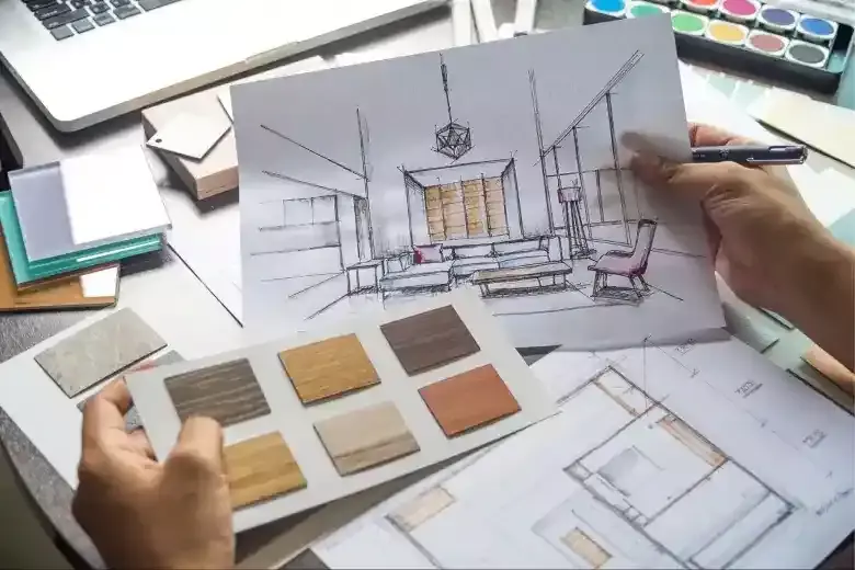 Residential interior designer mapping a room sketch with material card