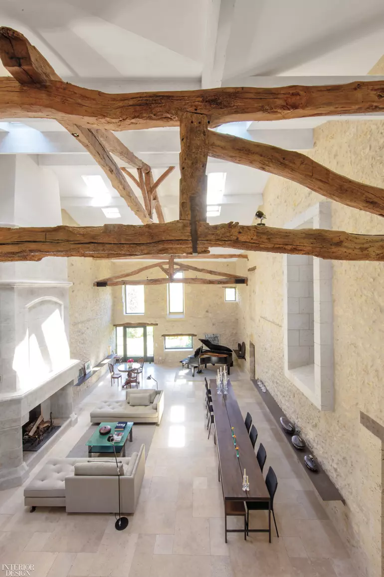 A hay loft was removed to gain ceiling height for the salon