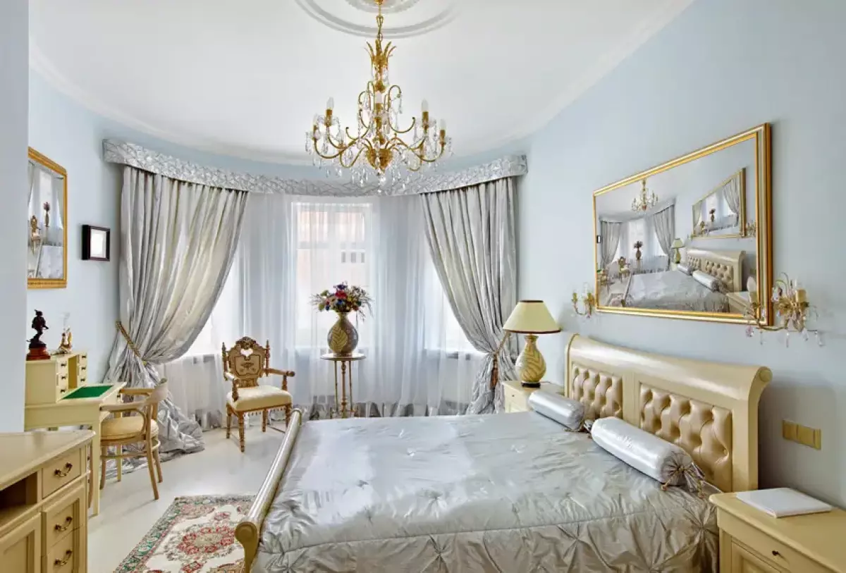 Luxury master bedroom in silver, gold and blue