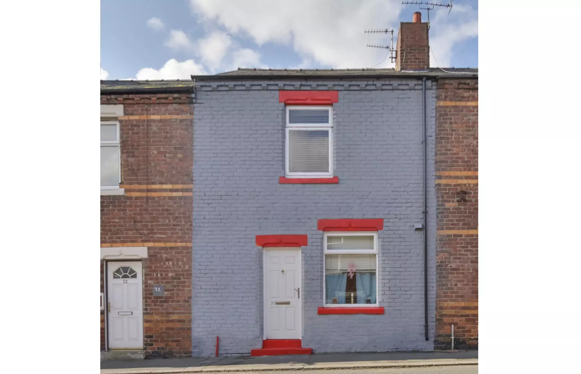 Located in County Durham, this distinctive property features a quirky, colorful facade.