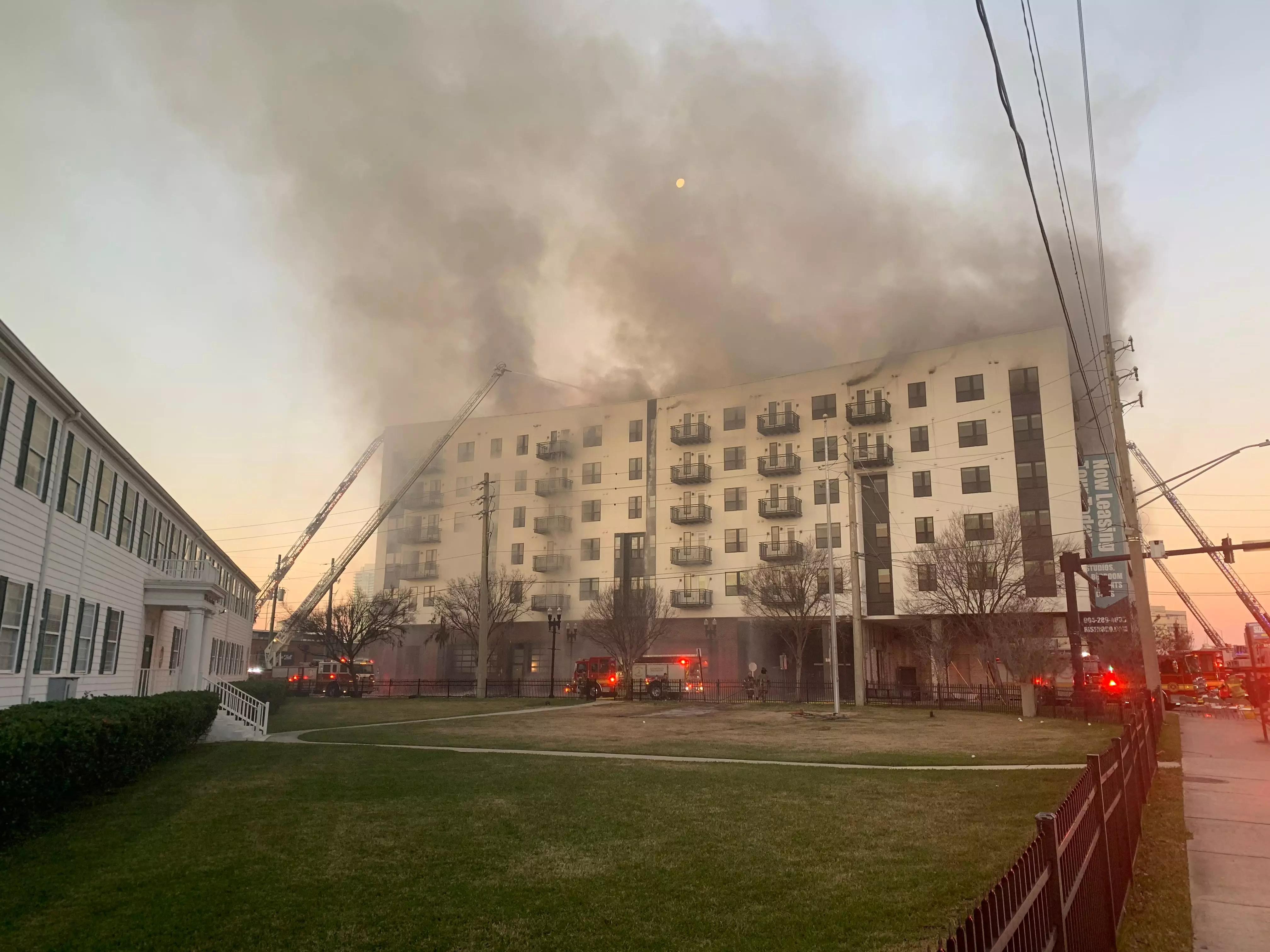 A fire in the RISE Doro apartment building caused smoke to be visible for miles Monday morning. The apartment complex has been under construction in the sports complex. Jacksonville firefighters were working to put out a fire that broke out overnight. The eight-floor building would have 247 apartments upon completion.