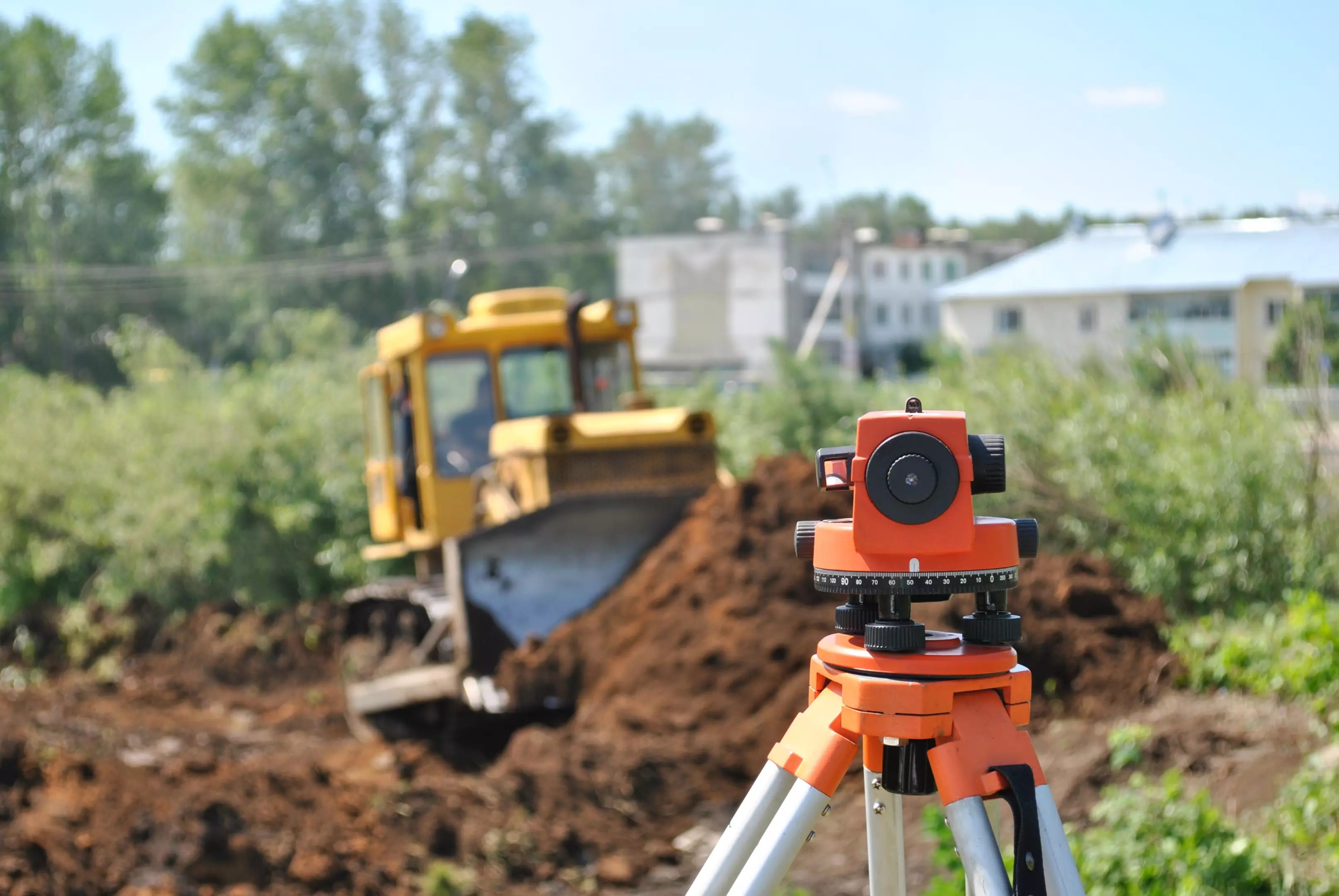 Surveying equipment and bulldozer