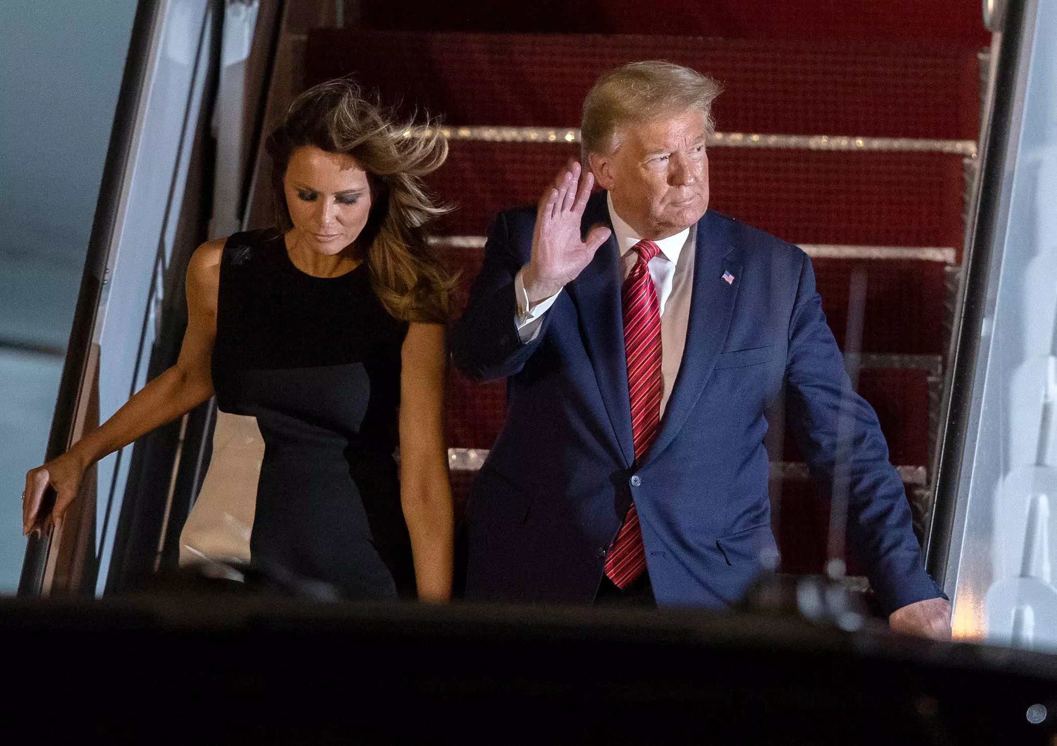President Donald Trump and first lady Melania Trump arrive in February at Palm Beach International Airport, about four miles from Mar-a-Lago, the president’s winter White House.