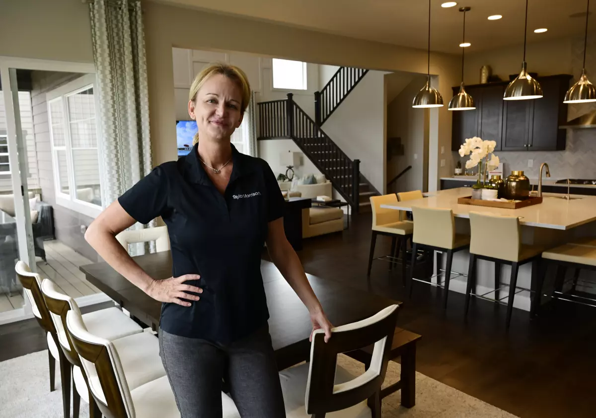 Ricarda Dietsch, Denver Division president for Taylor Morrison homes inside the model home, Vail at Macanta Sept. 22, 2022, in Castle Rock.
