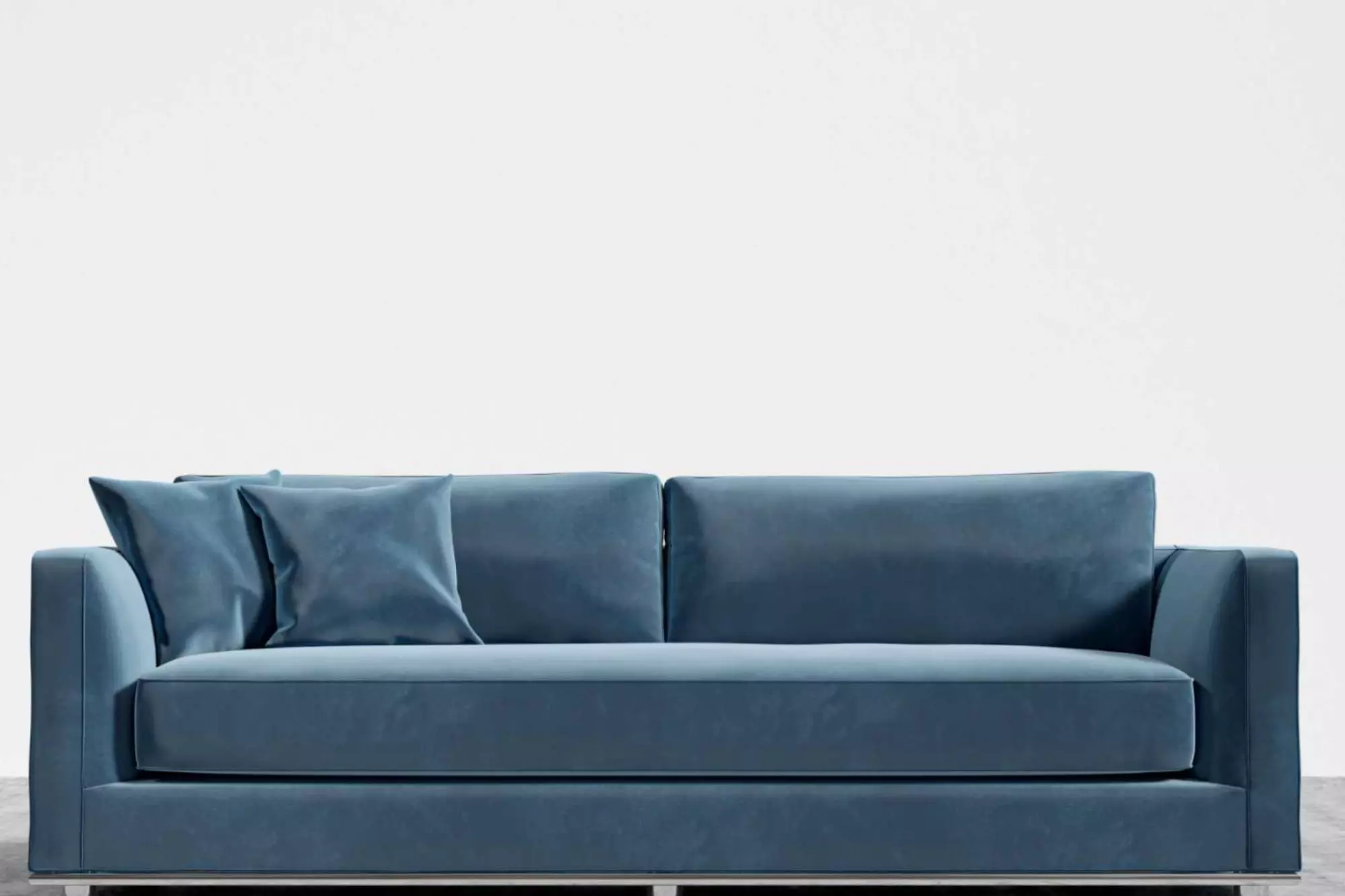 A blue velvet sofa sleeper