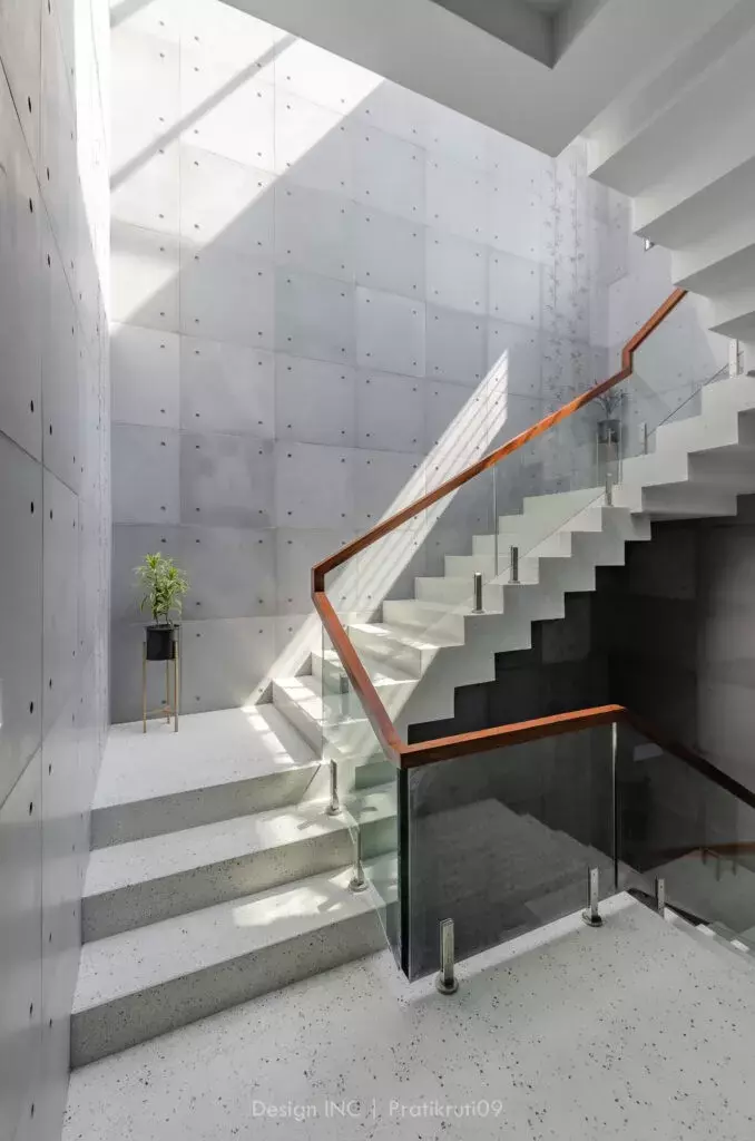 Exposed concrete in a stairwell; Project By: Hey Concrete