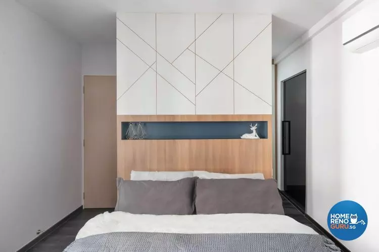 Bedroom with strong lines above the headboard