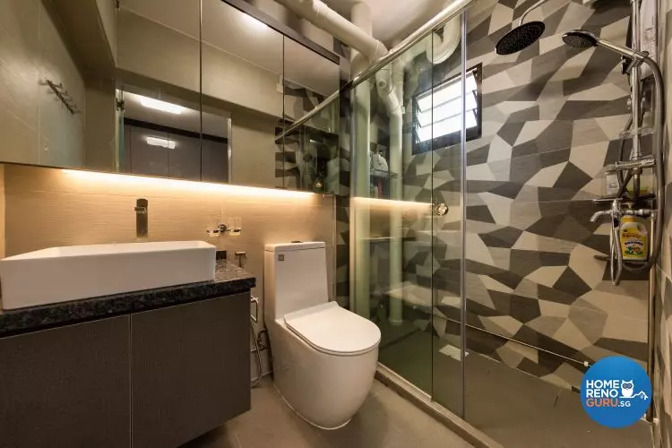 Bathroom with a quirky geometric shape feature wall