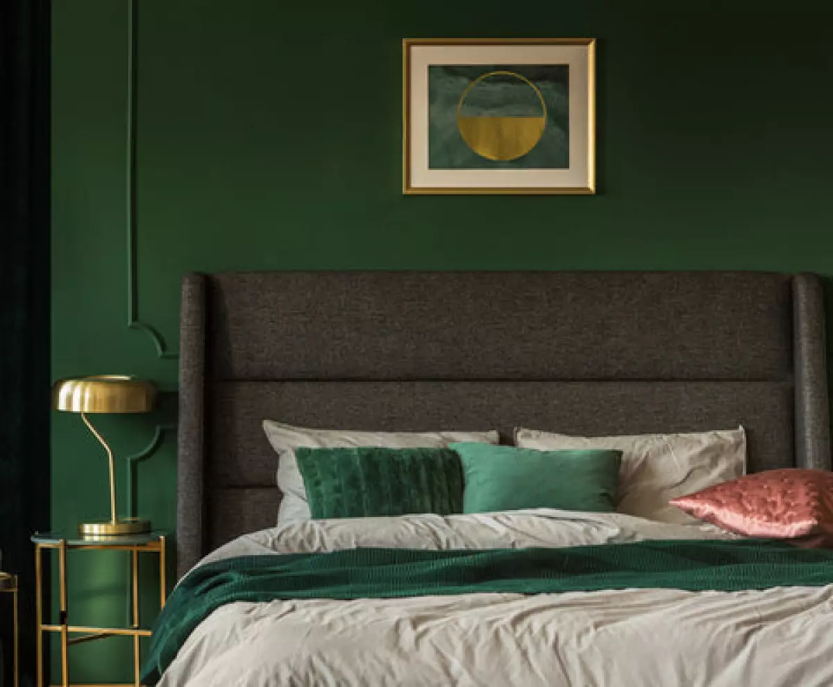 Beautiful forest green bedroom featuring Feng Shui bedroom colors