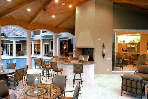 Large covered outdoor living area of a luxury home