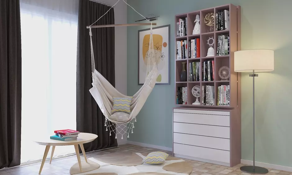 Bohemian-themed reading nook interior with a swing chair creates a cozy and inviting space
