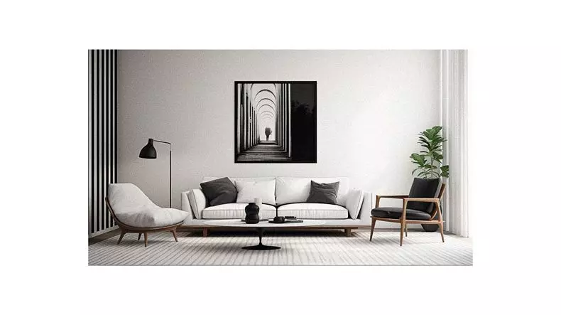 A black and white photo of a living room.