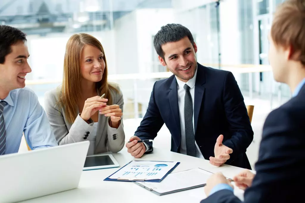 Two Agents Sitting at a Table