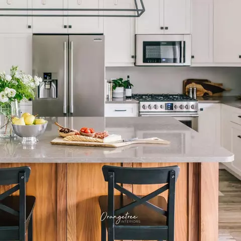 white kitchen with grey island