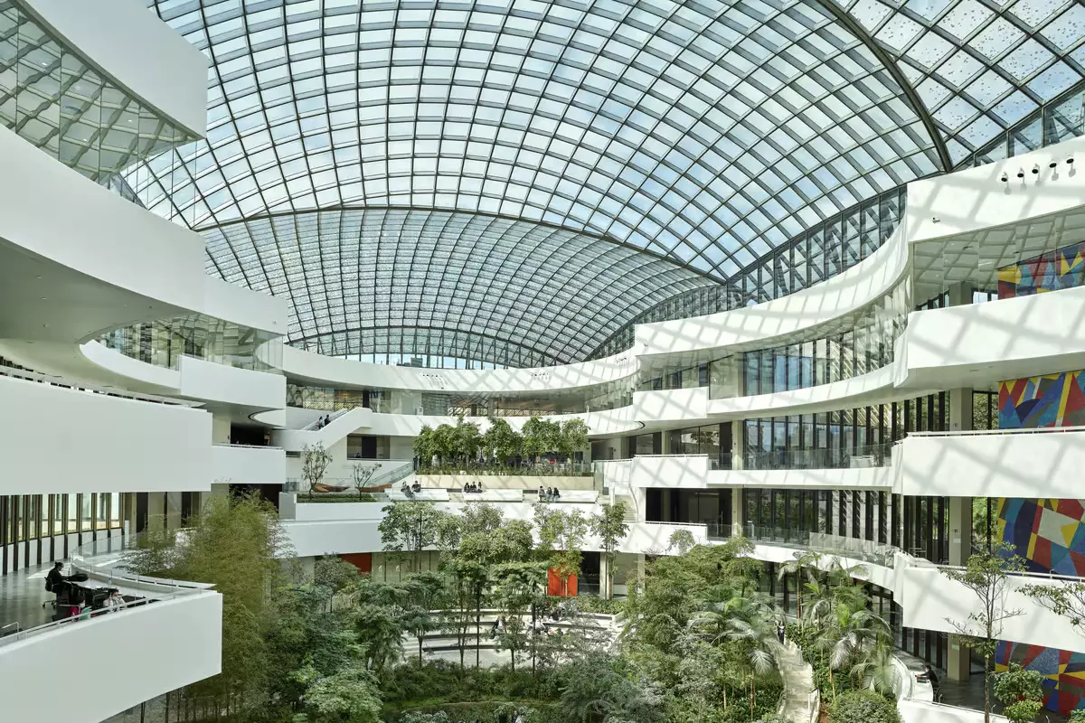 Medical center’s impressive glass roof spans lush green oasis